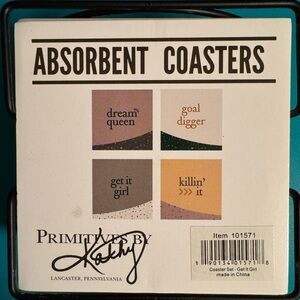 Never used, 4 absorbent coasters from Primitives by Kathy, comes w/metal stand.